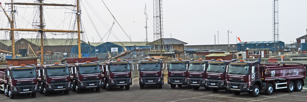 A row of Dudman Group tippers at Shoreham wharf